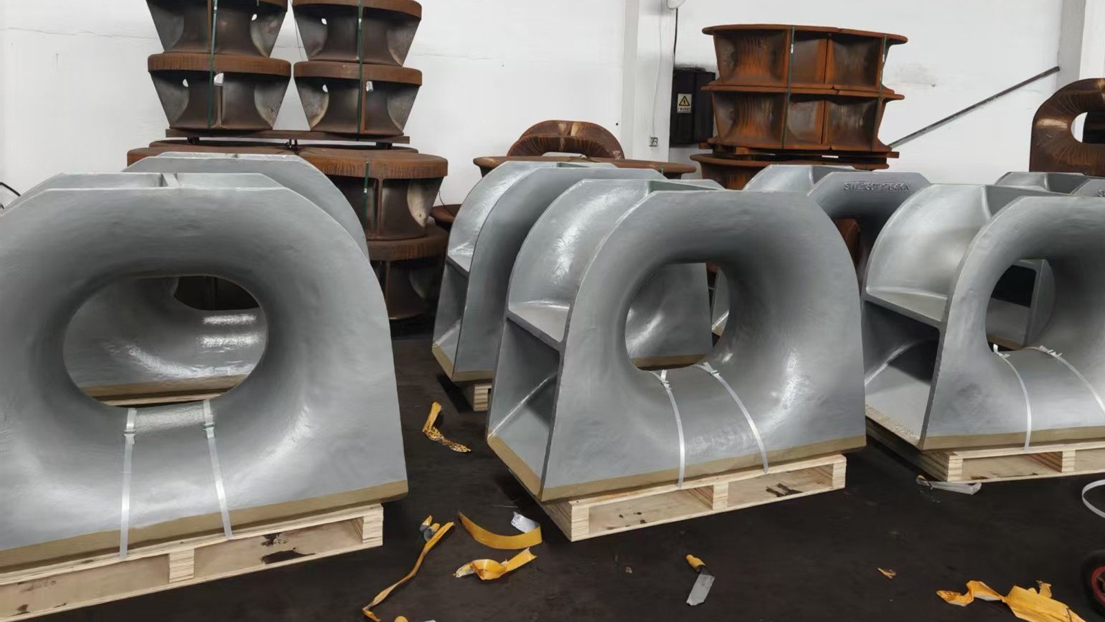 Finished 180-tonne towing chocks strapped to pallets at the maker&rsquo;s works