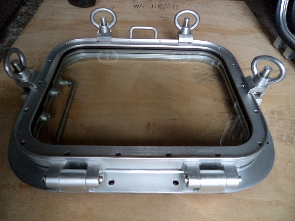 Large marine window frame with lifting eyes